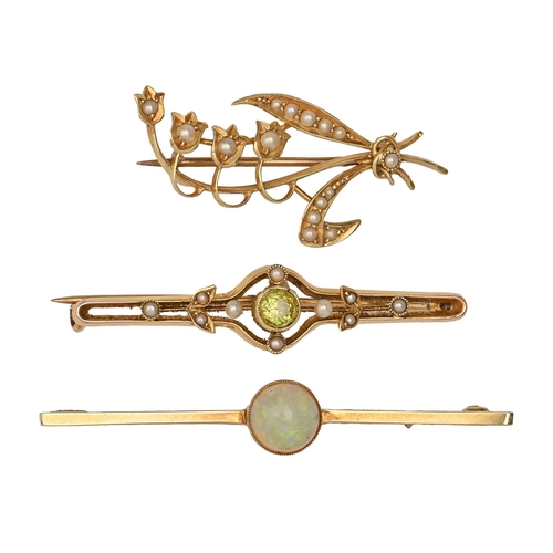 128 - A split pearl lily-of-the-valley brooch, early 20th c, in gold, 37mm l, marked 15ct, a peridot and s... 