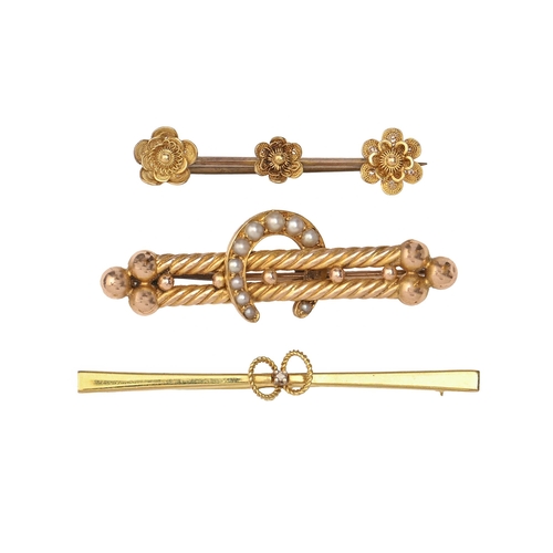 141 - A Victorian split pearl horseshoe brooch, in gold, 49mm l and two other gold bar brooches, 9.4g (3)... 