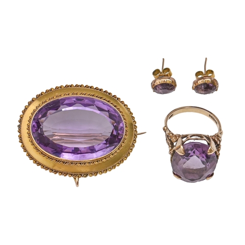 151 - A Victorian amethyst brooch, in gold, 40mm l, 16.7g and an amethyst ring and pair of ear studs, in g... 