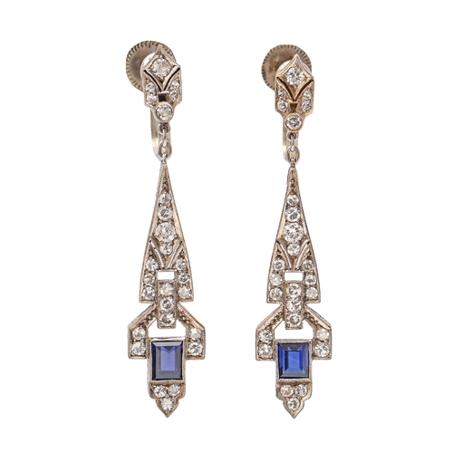 168 - A pair of sapphire and diamond earrings, with single calibre cut sapphire, in platinum and gold, scr... 