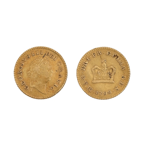 217 - Gold coin. George III, Third-Guinea, slightly crimped and some scratches, otherwise Fine... 