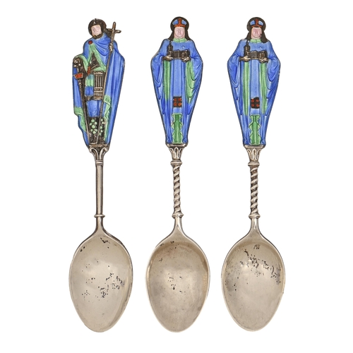 234 - One and a pair of arts and crafts silver and translucent enamel spoons, early 20th c, with saint ter... 