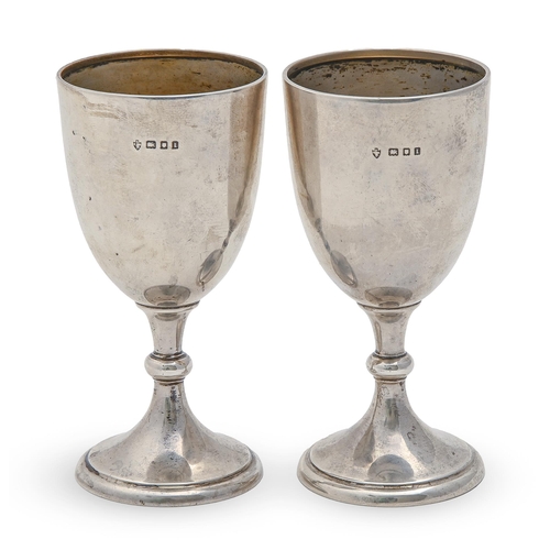 249 - A pair of George V silver goblets, 11cm h, marks rubbed London 1926, 3oz 4dwt, on silver mounted sta... 