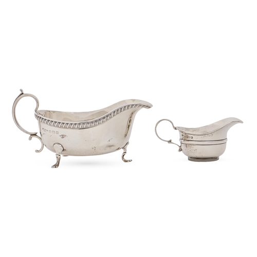 253 - A George V silver sauce boat and butter boat, 14 and 9cm l respectively, maker B & W Ltd, Birmin... 