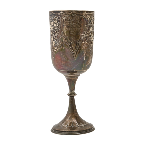 271 - A Victorian silver goblet, chased with lappet shaped panels of flowers, 22cm h, by George Unite &... 