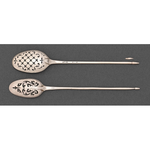 275 - Two George III silver mote spoons, one with rat tail, 14 and 14.4cm l, maker's mark T M only, or mak... 