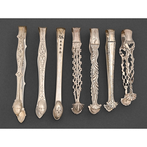 284 - Two pairs of George III silver cast openwork sugar tongs, one by Hester Bateman, London 1784-5, the ... 