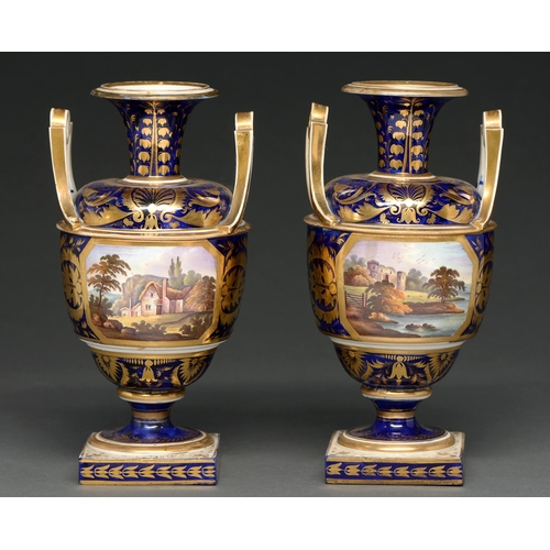 463 - A pair of Derby vases, c1830, painted with a landscape with cottage or ruined castle in octagonal gi... 