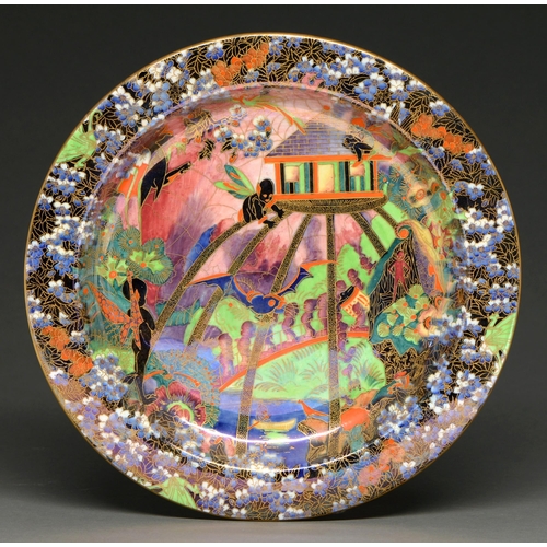 467 - A Wedgwood Fairyland lustre Imps on a Bridge and Treehouse dish, designed by Daisy Makeig-Jones, 191... 