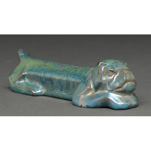 478 - A Rambervillers art deco iridescent glazed grey stoneware model of a dog, c1925, 11.5cm l, impressed... 