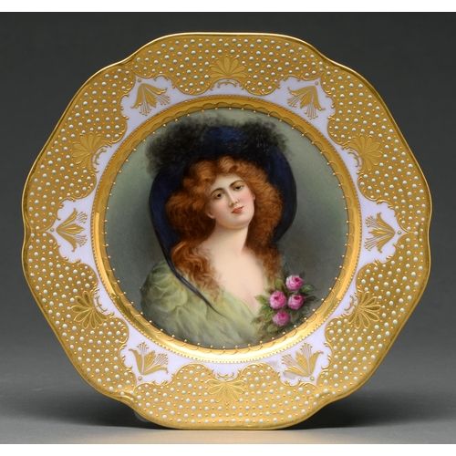 481 - A Vienna style plate, early 20th century, painted by Wagner, signed, with a raven haired young woman... 