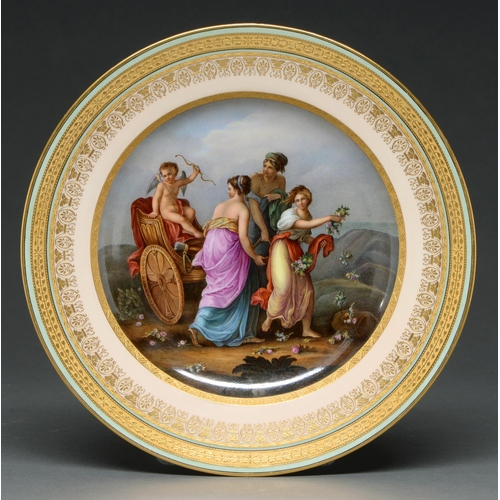 483 - A Vienna plate style, late 19th c, painted with Putto in his chariot in a hilly landscape attended b... 