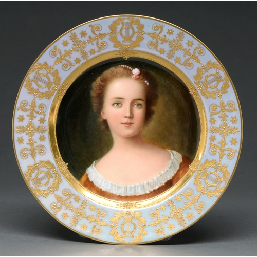 485 - A Vienna style porcelain plate, early 20th c, painted after Jean Marc Nattier with a portrait of Pri... 