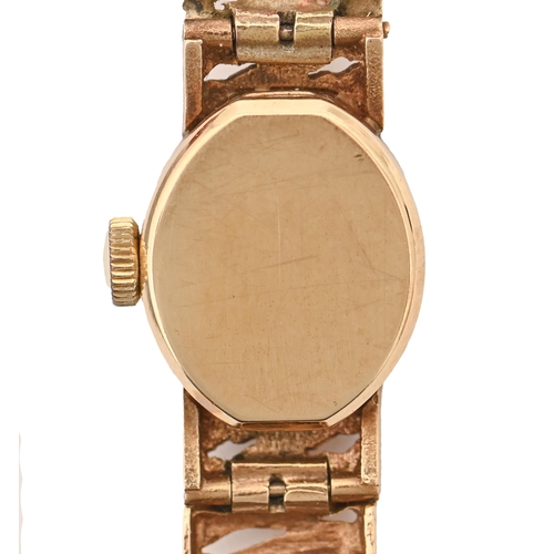 504 - A Rotary 9ct gold oval lady's wristwatch, 26mm, London 1972,  on bark textured 9ct gold bracelet, ma... 