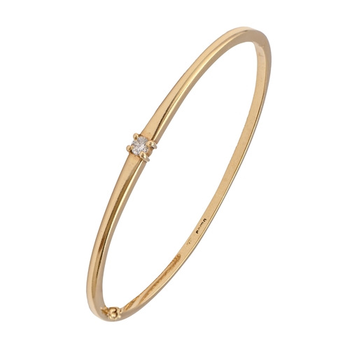 55 - A diamond bangle, in 18ct gold, 58mm (internal), marks rubbed, 15g