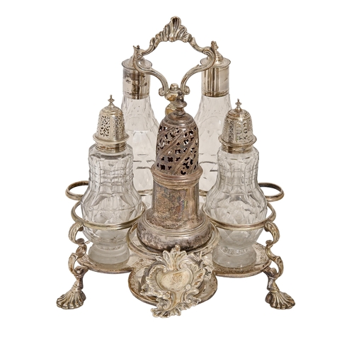 553 - A George II silver Warwick cruet, the frame crested on a chased rococo cartouche, on four shell feet... 