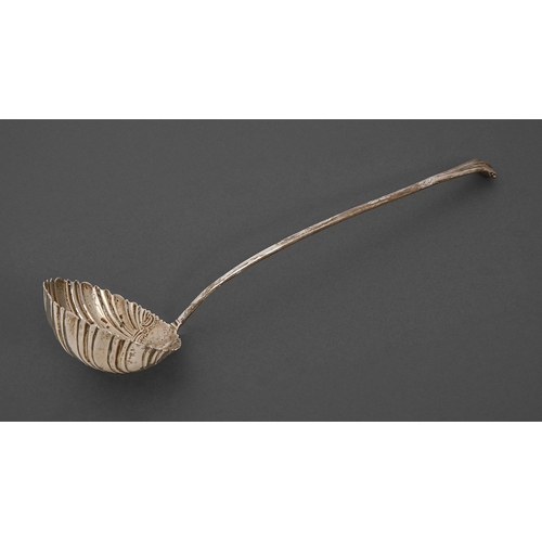 560 - A George III silver soup ladle, Onslow pattern, with chased shell bowl, crested, maker's mark rubbed... 