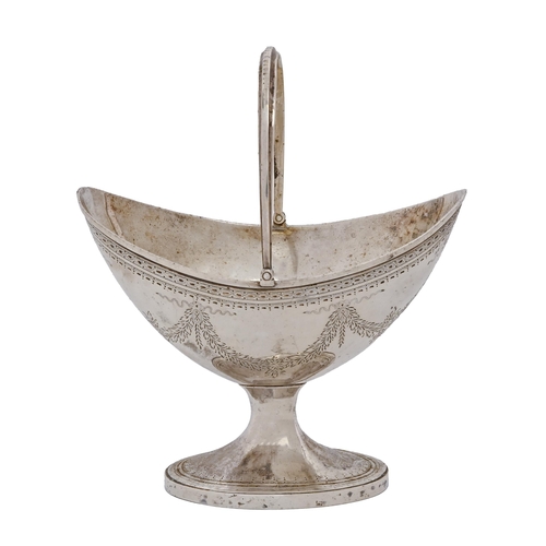 569 - A Victorian silver sugar basket, in neo classical style, engraved with festoons, swing handle, ... 