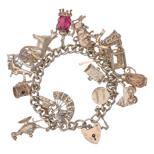 57 - A silver charm bracelet, with a collection of silver charms and padlock, 19cm l, 81g... 