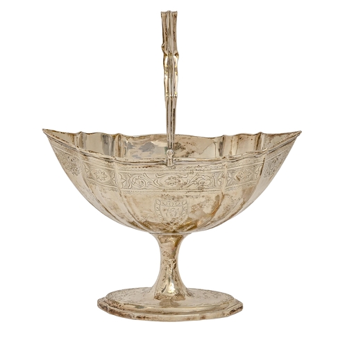 570 - An Irish George III silver sugar basket, on fluted pedestal, engraved border, swing handle, 22.5cm h... 