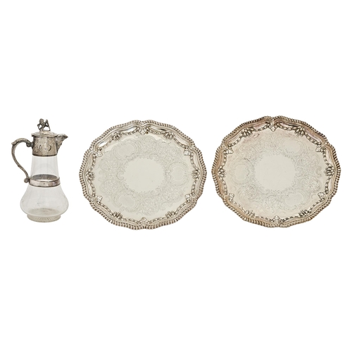 589 - A pair of Victorian EPNS salvers, with engraved field, husk cavetto and gadrooned rim, on three bun ... 