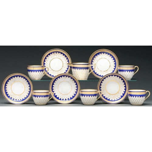 597 - Five Derby Bute shaped teacups and saucers and one cream jug, c 1790, gilt Vandyke ground and cobalt... 