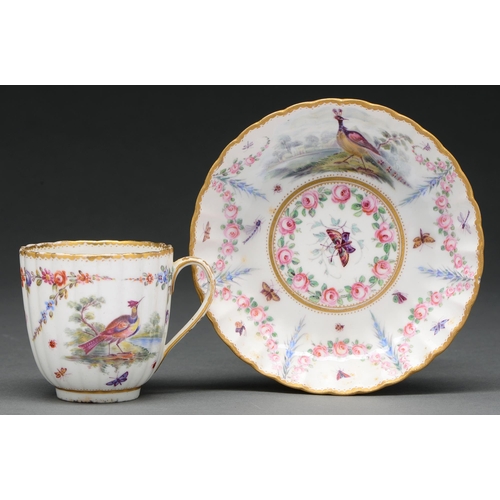 601 - A Derby fluted coffee cup and saucer, the porcelain c 1795, the decoration 19th century, painted wit... 