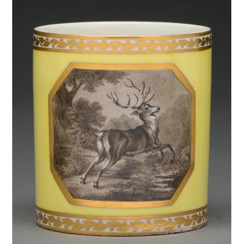 603 - A Derby yellow ground cabinet chocolate cup, c 1800, painted by John Brewer en grisaille with a deer... 