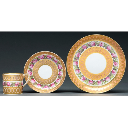 619 - A Derby coffee can, saucer and plate, c 1800, painted with a band of pink roses between bloom and gi... 