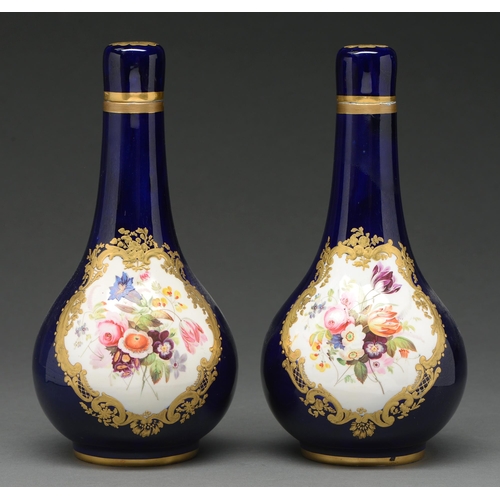 656 - A pair of Bloor Derby bottle shaped vases and stoppers, c 1835, painted with panels of birds and flo... 