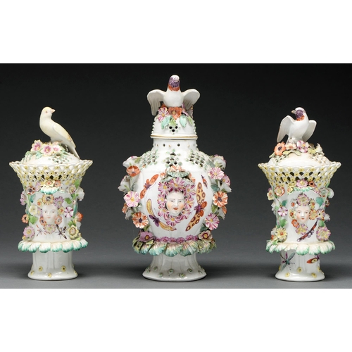 657 - A composed garniture of three Derby frill type vases and covers, c 1760, each domed cover with ... 