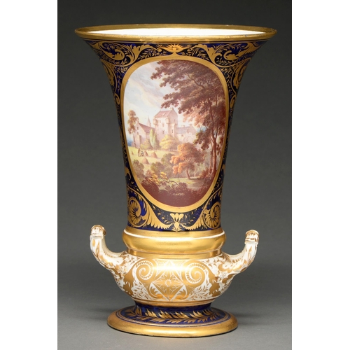 659 - A Derby vase, c 1815, of flared form on compressed base with twin gilt loop handles, painted wi... 