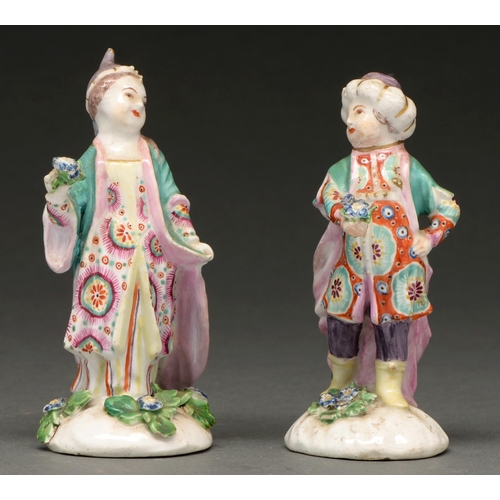 666 - Two Derby miniature figures of children attired as Turks, c 1770, enamelled in colours on sprigged b... 