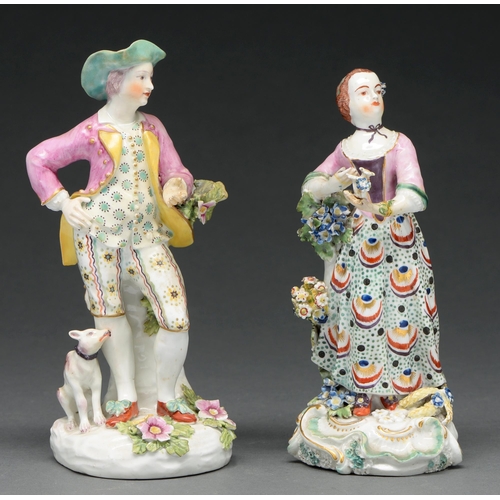 669 - A Derby figure of a youth, c 1780, in yellow lined puce coat, green spotted waistcoat and striped br... 