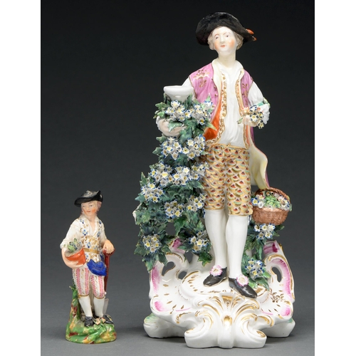 672 - A Derby candlestick figure of a gallant, c 1770, with a basket of flowers and holding a posy in his ... 