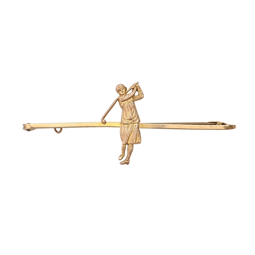 68 - A gold lady golfer bar brooch, c1920, 57mm l, marked 9ct, 2.9g