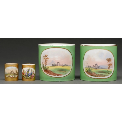 699 - Two Coalport miniature coffee cans, c 1880, painted with a landscape, the other flowers, richly gilt... 