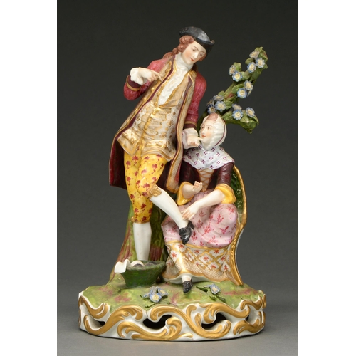 708 - A Derby style group of a gallant and a maid, 19th/20th c, in the 18th c taste, in polychrome enamels... 