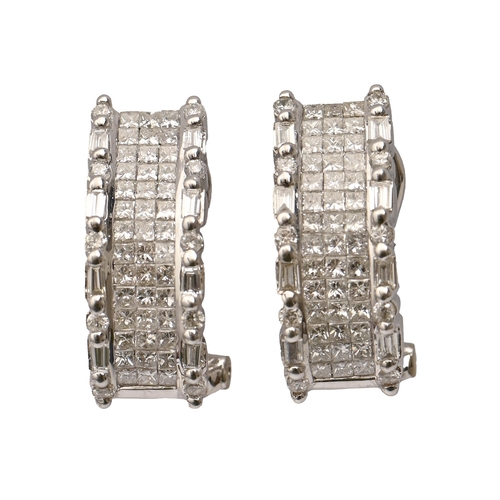 71 - A pair of diamond earrings, pavé set, in white gold, 19mm h, marked 18K 750, 6.2g... 