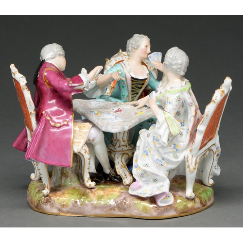 711 - A Meissen group of card players, second half 19th c, in the 18th c taste, each seated at a tria... 