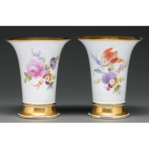 718 - A pair of Meissen flared cylindrical vases, late 20th c, painted with loose bouquets between bu... 