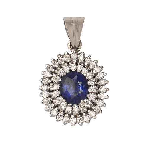 73 - A sapphire and diamond pendant, in white gold, cluster 14 x 15mm, marked 585, 3.7g