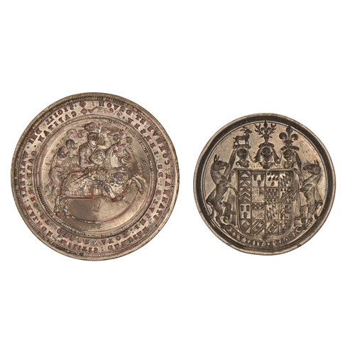 752 - A white metal armorial seal, 19th c, the circular intaglio matrix with a full heraldic achievement, ... 