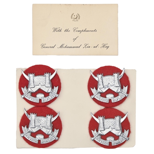 753 - Militaria. Khyber Rifles cap badges, four, and a printed card with the compliments of General Mohamm... 