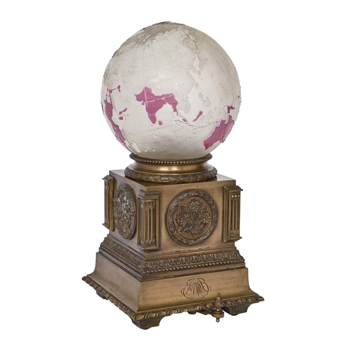 766 - A bronze-lacquered brass and etched-pink cameo glass terrestrial globe desk or table lamp, probably ... 