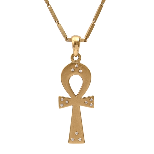 77 - An Egyptian diamond set gold ankh pendant, 37mm h, control mark and a gold necklet, marked 585, 14.8... 