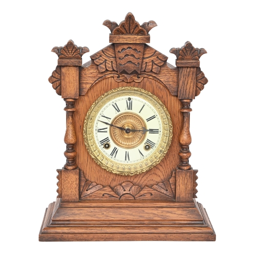 771 - An American carved wood mantle clock, with Ansonia Clock Company New York USA, 38cm h... 