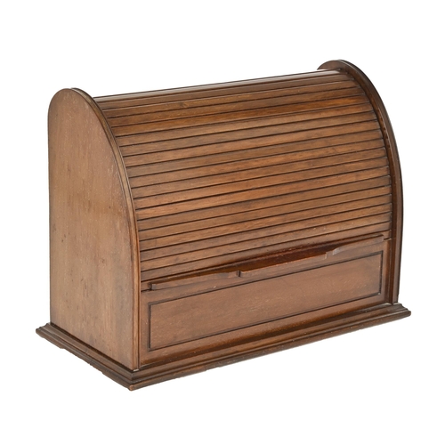 774 - A mahogany stationery cabinet, early 20th c, enclosed by tambour shutter, 28cm h