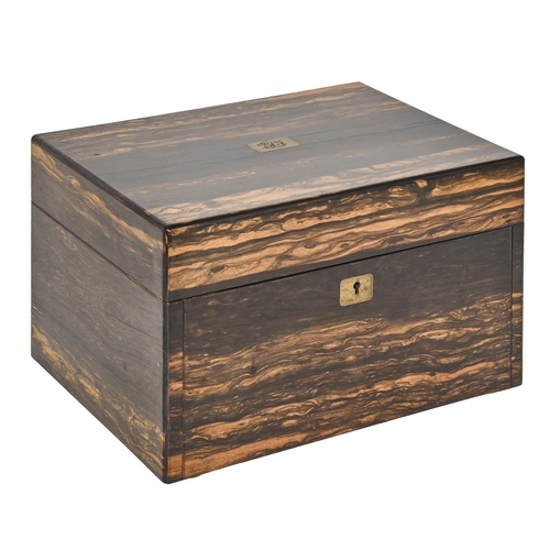 781 - A Victorian coromandel or 'Marble Wood' dressing case, the fitted interior retaining the compliment ... 