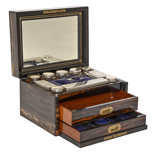 781 - A Victorian coromandel or 'Marble Wood' dressing case, the fitted interior retaining the compliment ... 